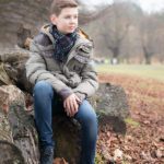 child-photo-shoot-rustic-boy-on-log